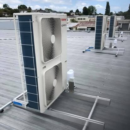 Large Toshiba commercial outdoor unit installed on rooftop